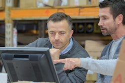 People in warehouse shopping online