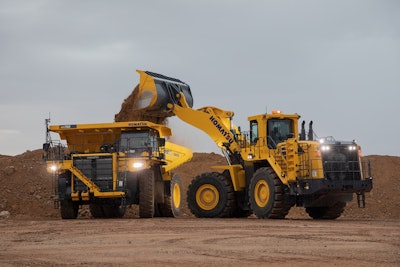 Komatsu HD785-8 Haul Truck being loaded by a wheel loader