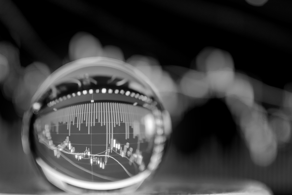 Crystal ball with chart inside for market conditions