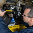 Bendix technician working on a wheel end
