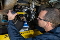 Bendix technician working on a wheel end