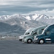 Three trucks parked in rest area in Rocky Mountains