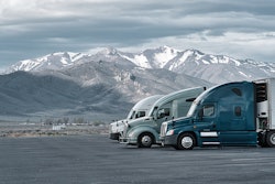 Three trucks parked in rest area in Rocky Mountains