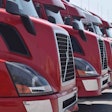 Group of Volvo used trucks parked on a truck lot
