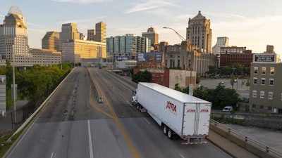 XTRA Lease trailer entering city