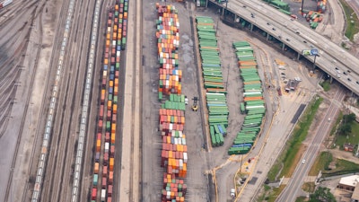 Aerial view of a crowded railyard in suburban Chicago
