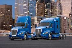 Two Kenworth tractors parked side by side