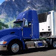 Reefer truck with Carrier Transicold unit attached to trailer.