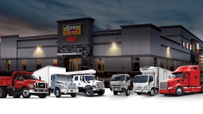 Rush Truck Center with trucks in front