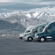 Three trucks parked in rest area in Rocky Mountains