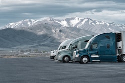 Three trucks parked in rest area in Rocky Mountains