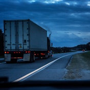 Truck on road with smoke