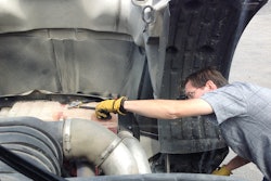 Technician working on a truck
