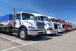 Line of trucks on a summer day