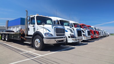 Line of trucks on a summer day