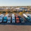 Overhead view of many trucks parked