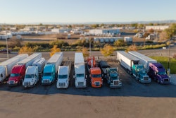 Overhead view of many trucks parked