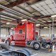 Trucks in a maintenance bay
