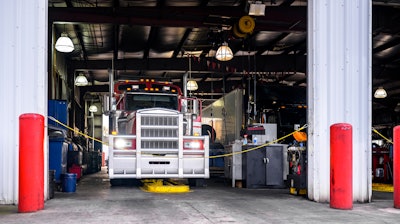 Truck in a service bay