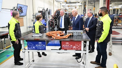 President Joe Biden tours a Volvo Trucks facility in Hagerstown, Md.