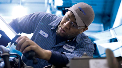 Idealease tech working on truck