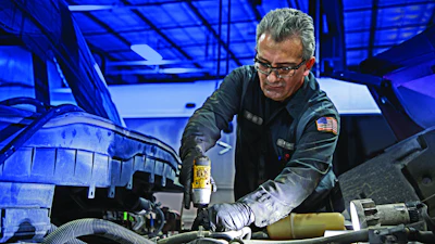 Idealease technician working on a truck