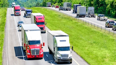 Trucks going down hill on the highway