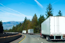 Trio of trailers on highway