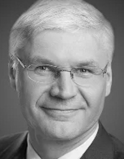 A headshot of Wilfried Aulbur, senior parter at Roland Berger