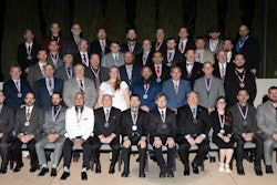 Group of people seated for a photo.