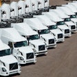Group of trucks prepared for sale with Ritchie Bros.