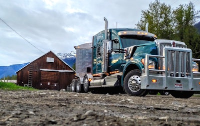 Kenworth truck in a rural community