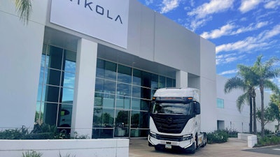 Nikola truck in front of facility