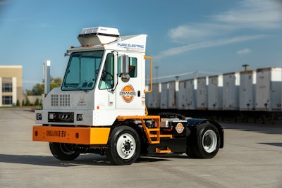 An Orange EV electric truck.