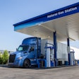 Blue Freightliner Cascadia with Allison transmission at fuel pump