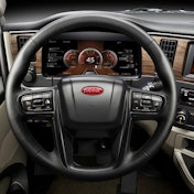 The instrument panel of a new Peterbilt truck with the controls for lane assist technology.