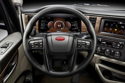 The instrument panel of a new Peterbilt truck with the controls for lane assist technology.