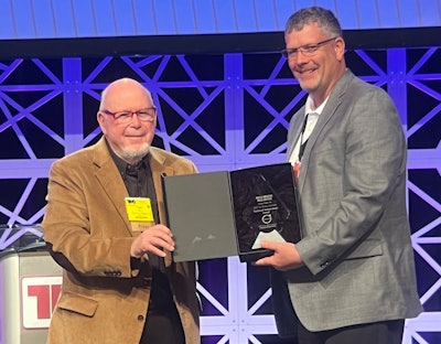 Duane Tegels, product marketing manager for Volvo Powertrain, accepts the Truck Writers’ Jim Winsor Technical Achievement Award from Tom Berg, who announced Volvo’s I-Torque as the award’s 2023 winner. The presentation was made during a Technology & Maintenance Council meeting in Orlando.