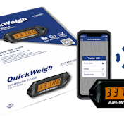 A QuickWeight on board scale and box.