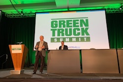 Bruce Vasbinder, director of medium duty marketing at International Trucks (left) and Kevin Holland, International's director of zero emissions consulting and solutions, talked about spec'ing an electric truck chassis before a sold out crowd Tuesday at Work Truck Show's Green Truck Summit at the JW Marriott in Indianapolis.
