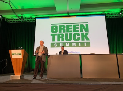 Bruce Vasbinder, director of medium duty marketing at International Trucks (left) and Kevin Holland, International's director of zero emissions consulting and solutions, talked about spec'ing an electric truck chassis before a sold out crowd Tuesday at Work Truck Show's Green Truck Summit at the JW Marriott in Indianapolis.