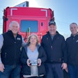 Advantage Truck Group announced the winners of the 2022 Pete DePina Legacy Award. From left are Advantage Truck Group President and CEO Kevin Holmes, service advisor Ellie Clauss, service manager Greg Hatfield, and Vice President of Network Truck Sales Chris Marsh.