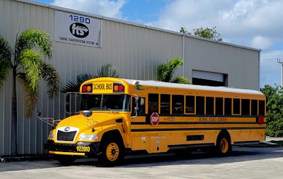 A school bus in a lot.