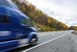 Blurry truck on highway