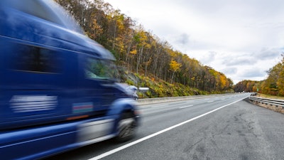 Blurry truck on highway