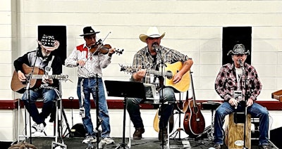 Taylor Barker and his band onstage at the event