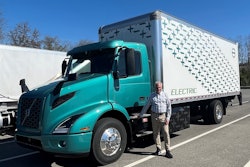 Sen. Tim Kaine, D-Virigina, stands in front of a truck.
