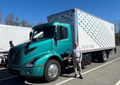 Sen. Tim Kaine, D-Virigina, stands in front of a truck.