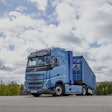 A blue Volvo hydrogen fuel cell truck