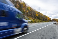 Blurry truck on highway